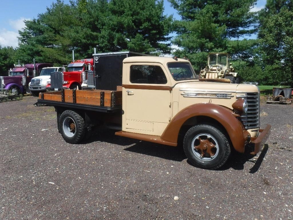This 1949 Diamond T 201 flatbed pickup truck—along with doors, fenders, tires, hub caps, and other Diamond parts—are selling on HiBid.