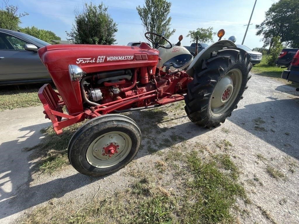Motorcycles, cars, scooters, generators, and farm machinery like this Ford 661 Workmaster tractor are up for bidding on HiBid.com.