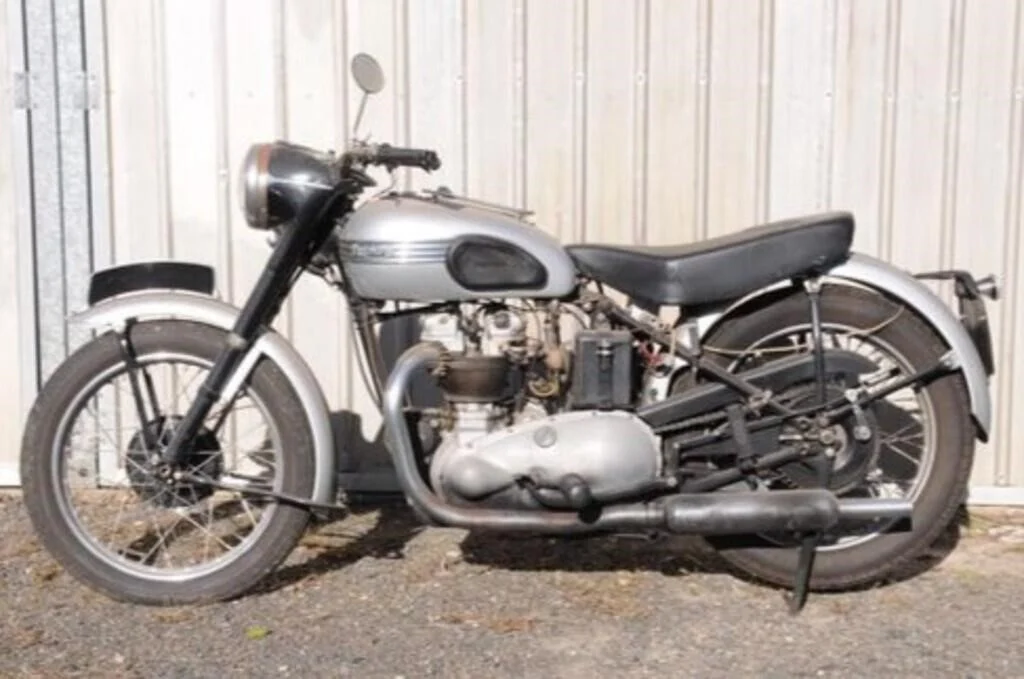 This 1951 Triumph Tiger 100 is one of numerous vintage motorcycles, antique cars, and sports cars up for auction this week on HiBid.com.