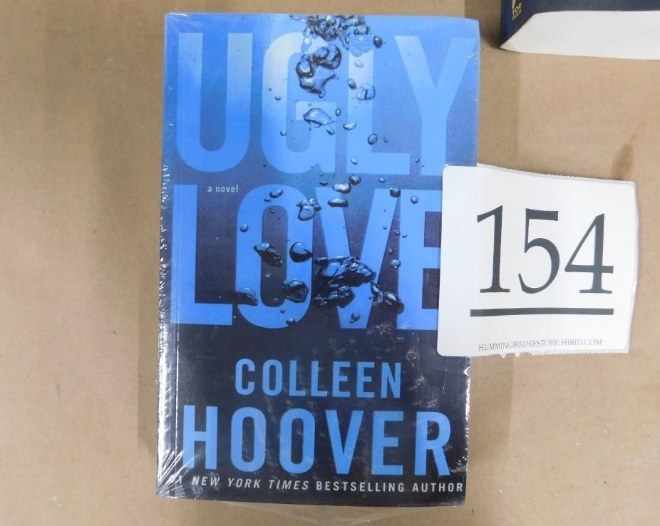 A wrapped copy of “Ugly Love” by Colleen Hoover.