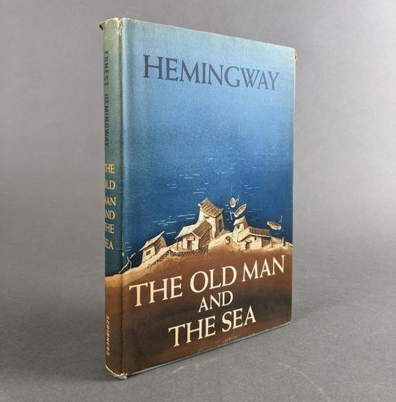 A first edition copy of “The Old Man and the Sea” by Ernest Hemingway.