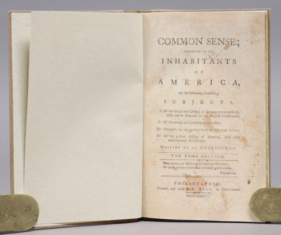 A third edition copy of “Common Sense” open to the cover page.