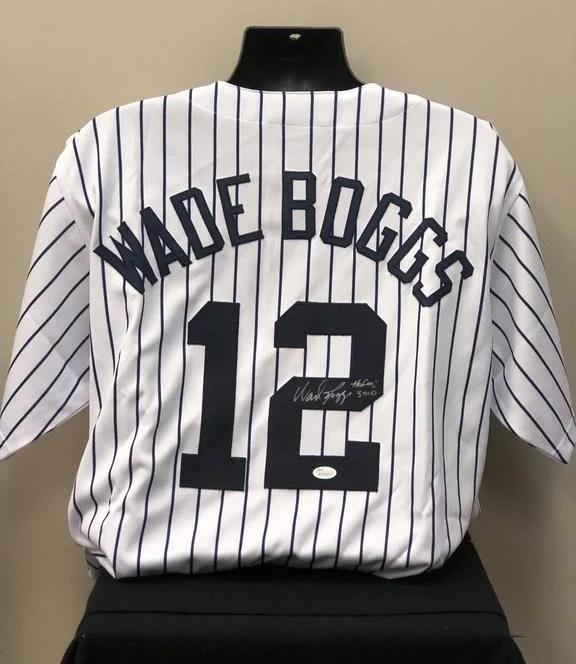 Wade Boggs number 12 autographed replica New York Yankees jersey on display.
