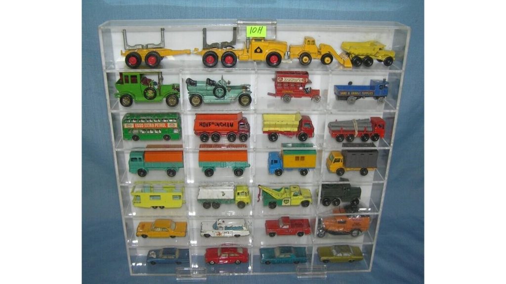 Matchbox cars and trucks from the 1950s and 1960s on display.