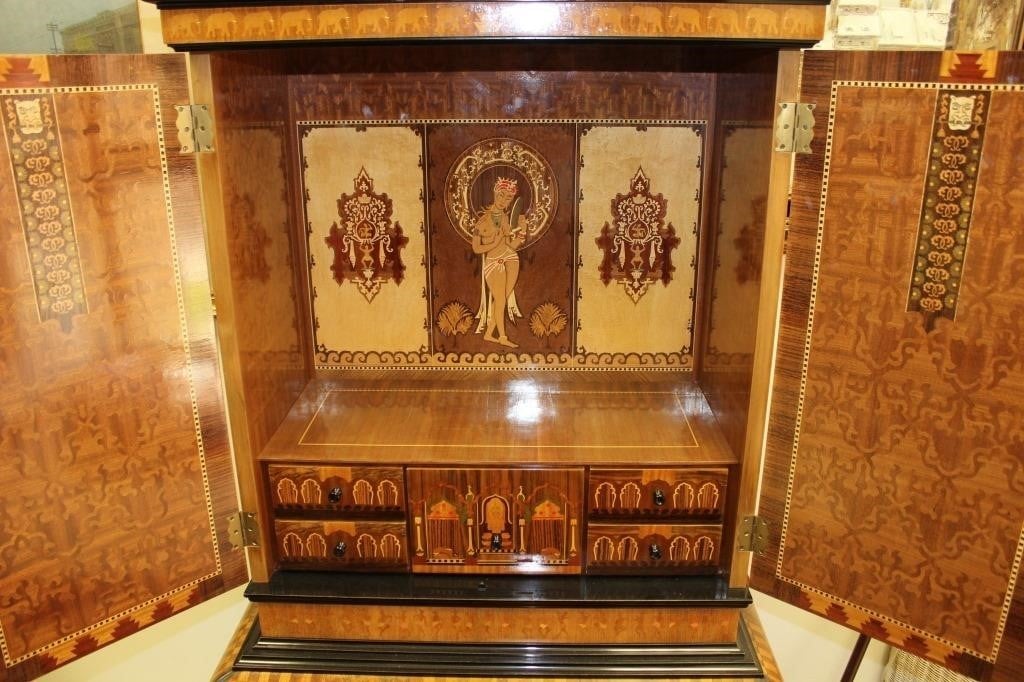 An early 20th century wedding chest with detailed inlay throughout.