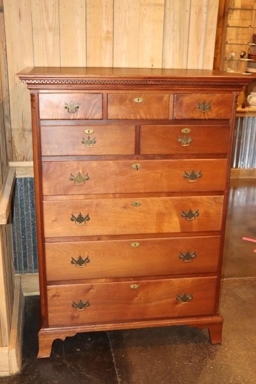 An original American Chippendale chest of drawers built circa 1780 in a five-over-four style with fluted quarter columns.